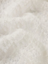 The Delicate Tie Sweater