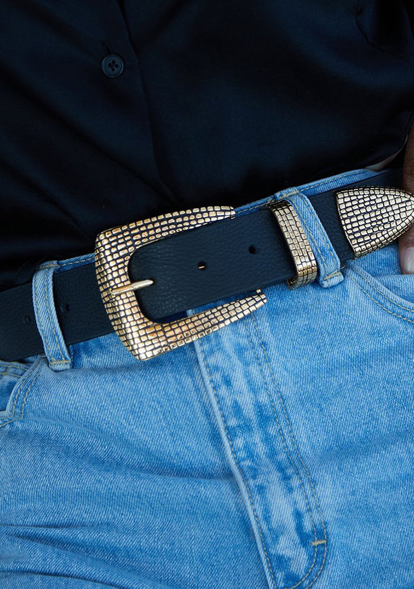 leather belt with gold buckle