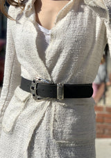 Black leather belt with silver buckle with crystals